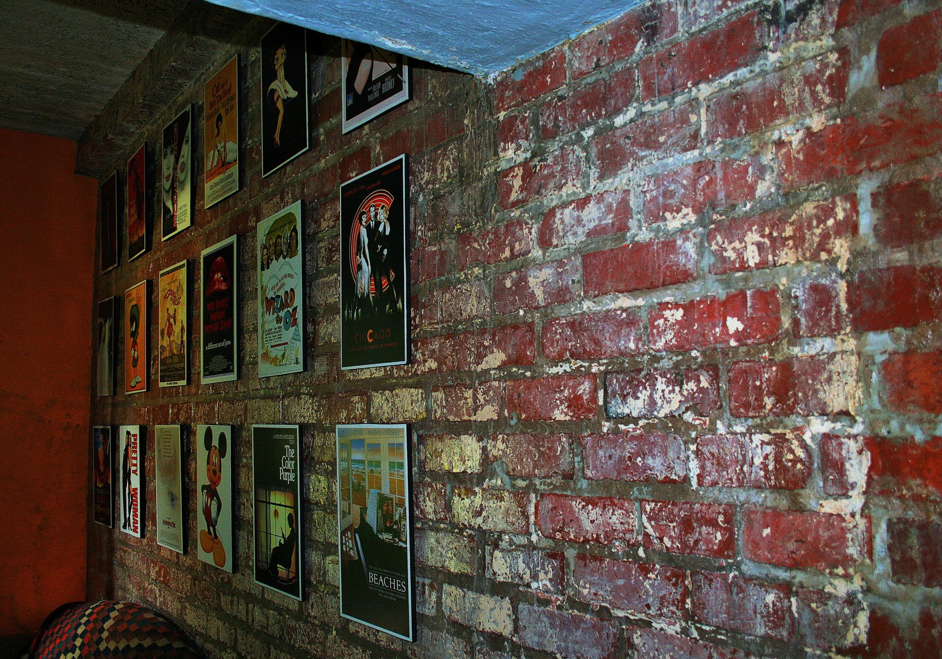 Unplastered Wall And Posters