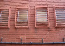 Upper Windows On Brick Building