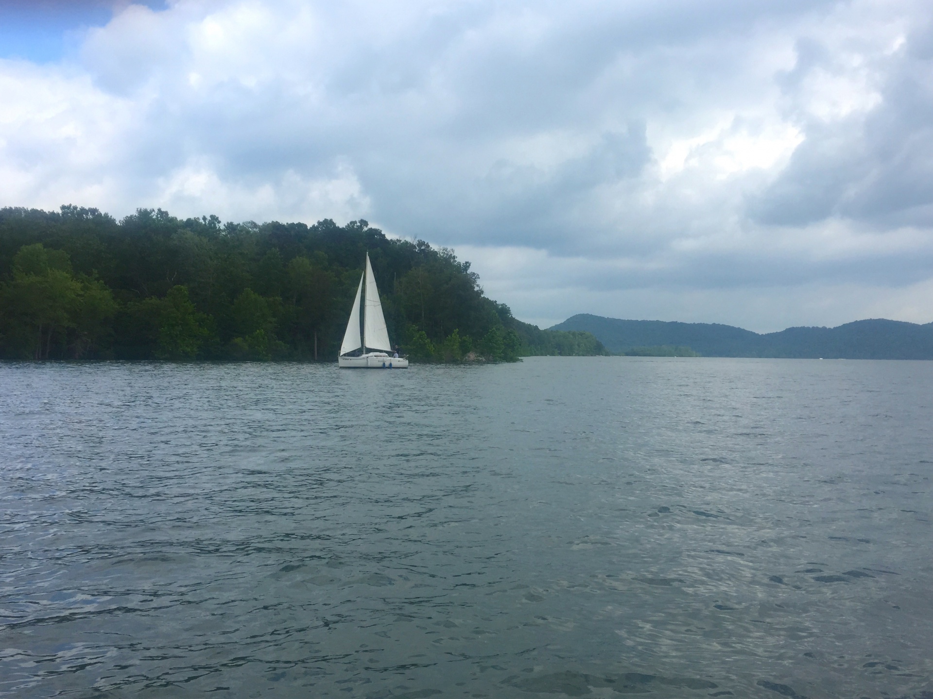 Lake Scene With Sailboat