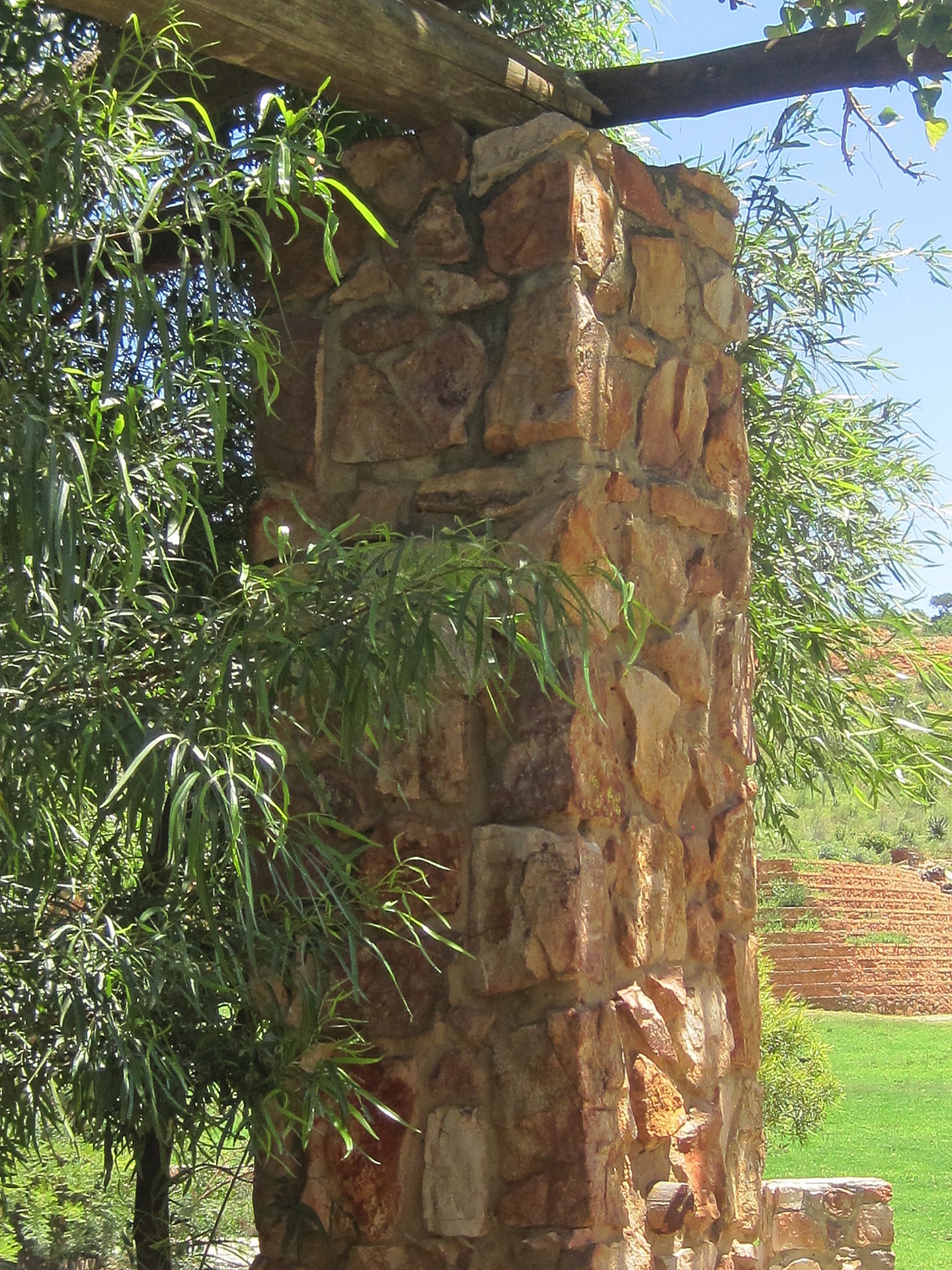 Stone Pillar And Tree
