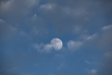 Near Full Moon And Clouds