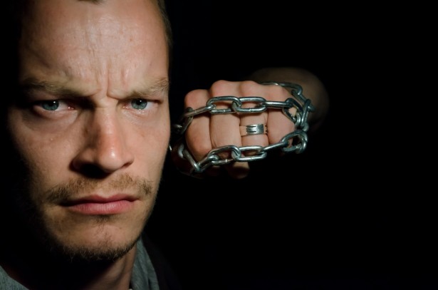 angry-man-with-chains.jpg