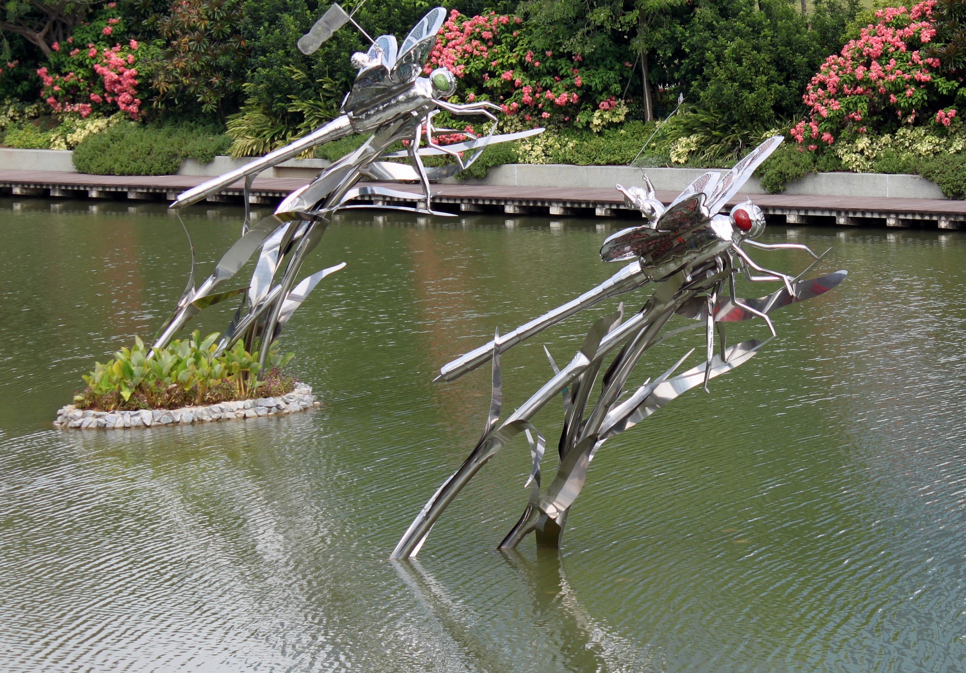 Steel Dragon Fly On The Lake