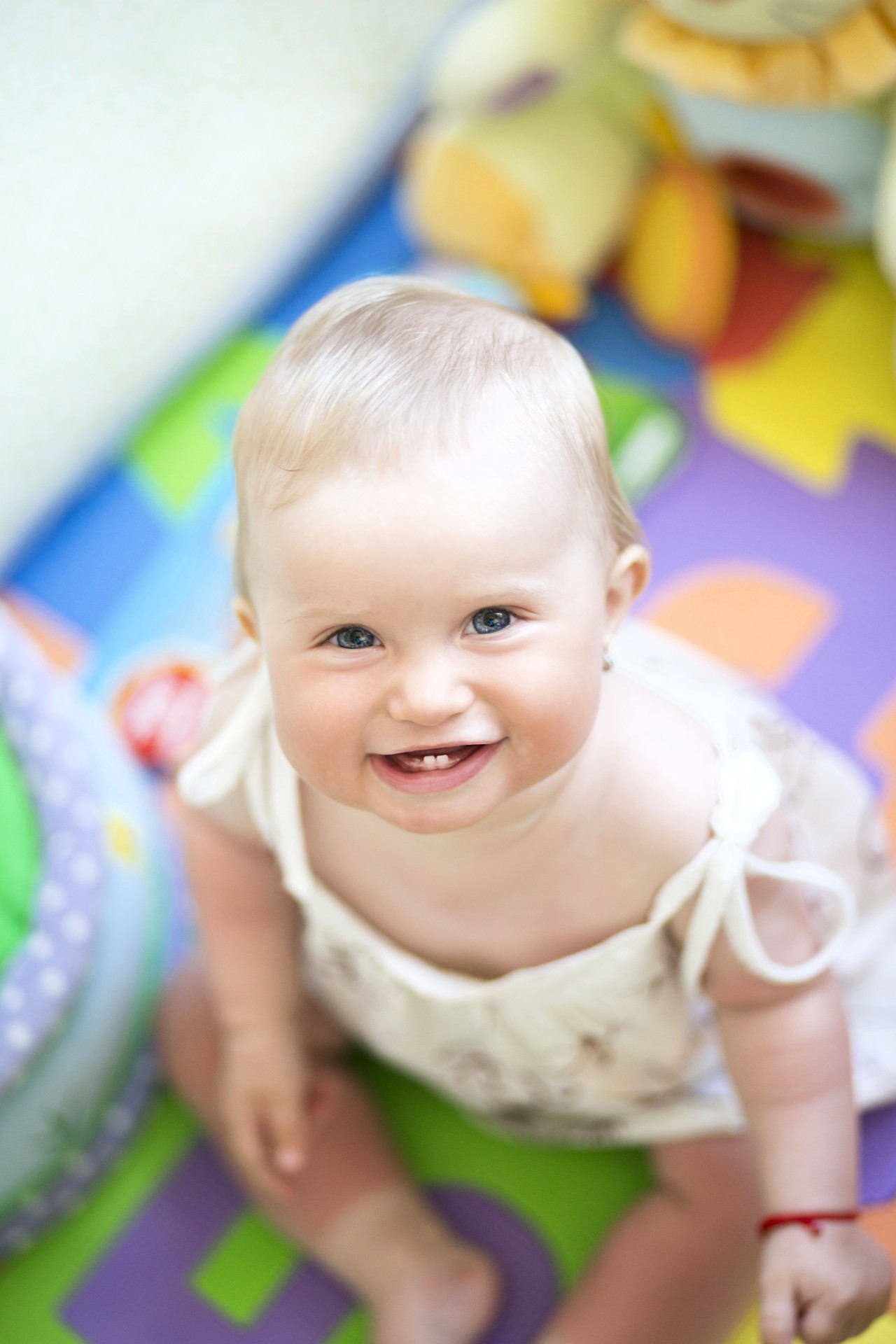 Smiling Baby With Toys Free Stock Photo - Public Domain Pictures
