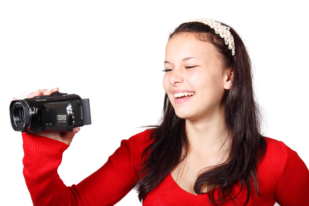 Girl with video camera