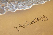 Word vacanţă în sand