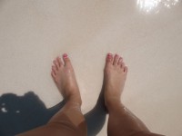 Dedos de los pies en la arena