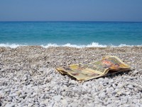 газеты на пляже