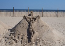 Merci Jésus sculpture de sable