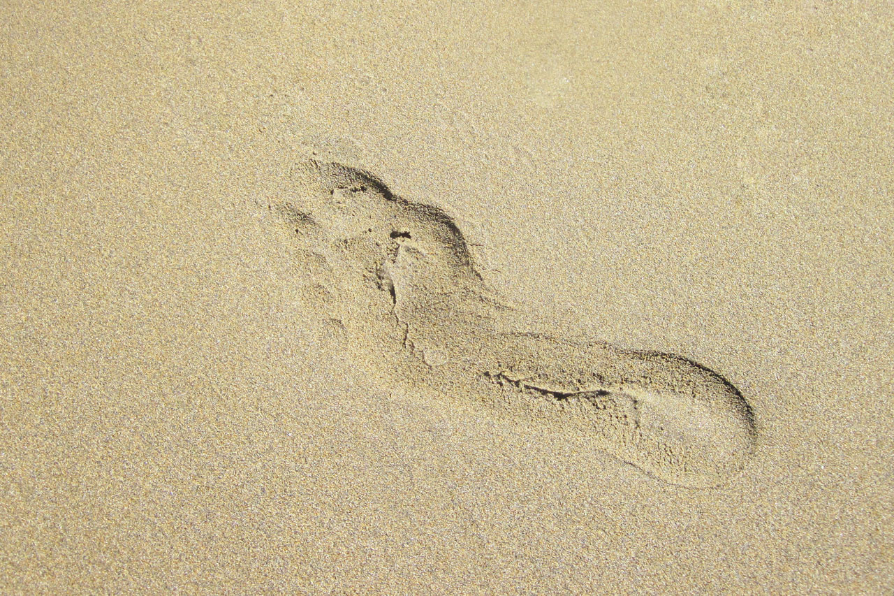 Fotavtryck i Sand