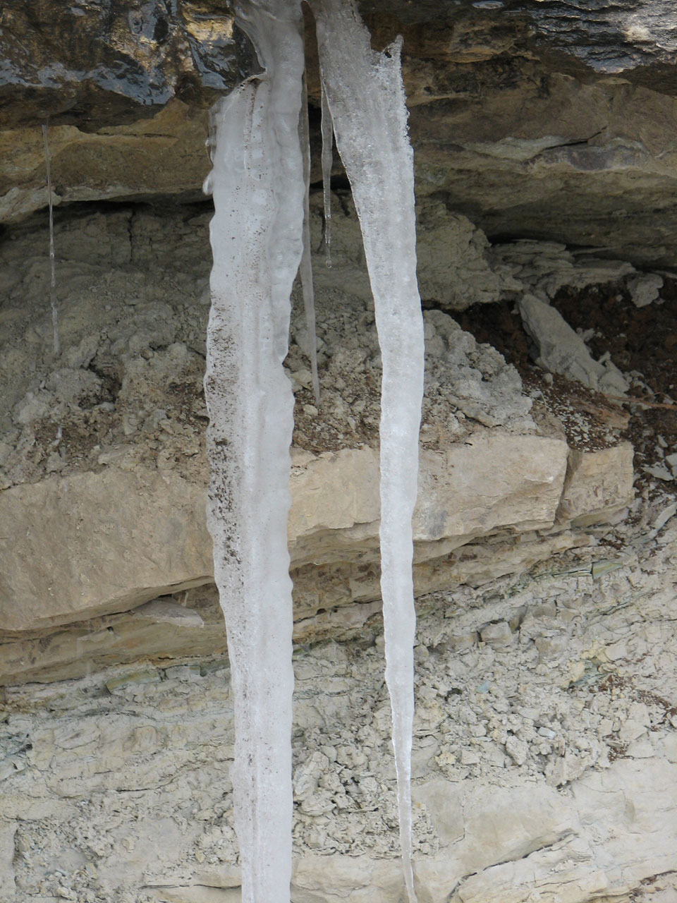 Icicle Water Drip Against Rock