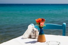 Table with flowers and sea