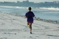 Женщина бегуном