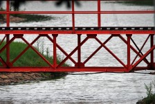 Model train bridge over pond