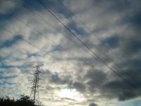 Overhead cables with clouds