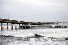 Waves Crashing Against Pier