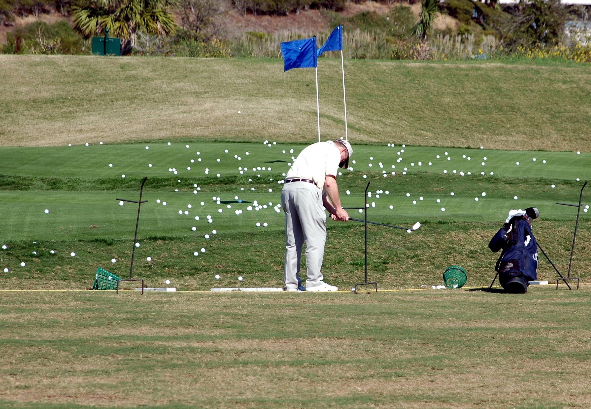 Golfer Practicarea