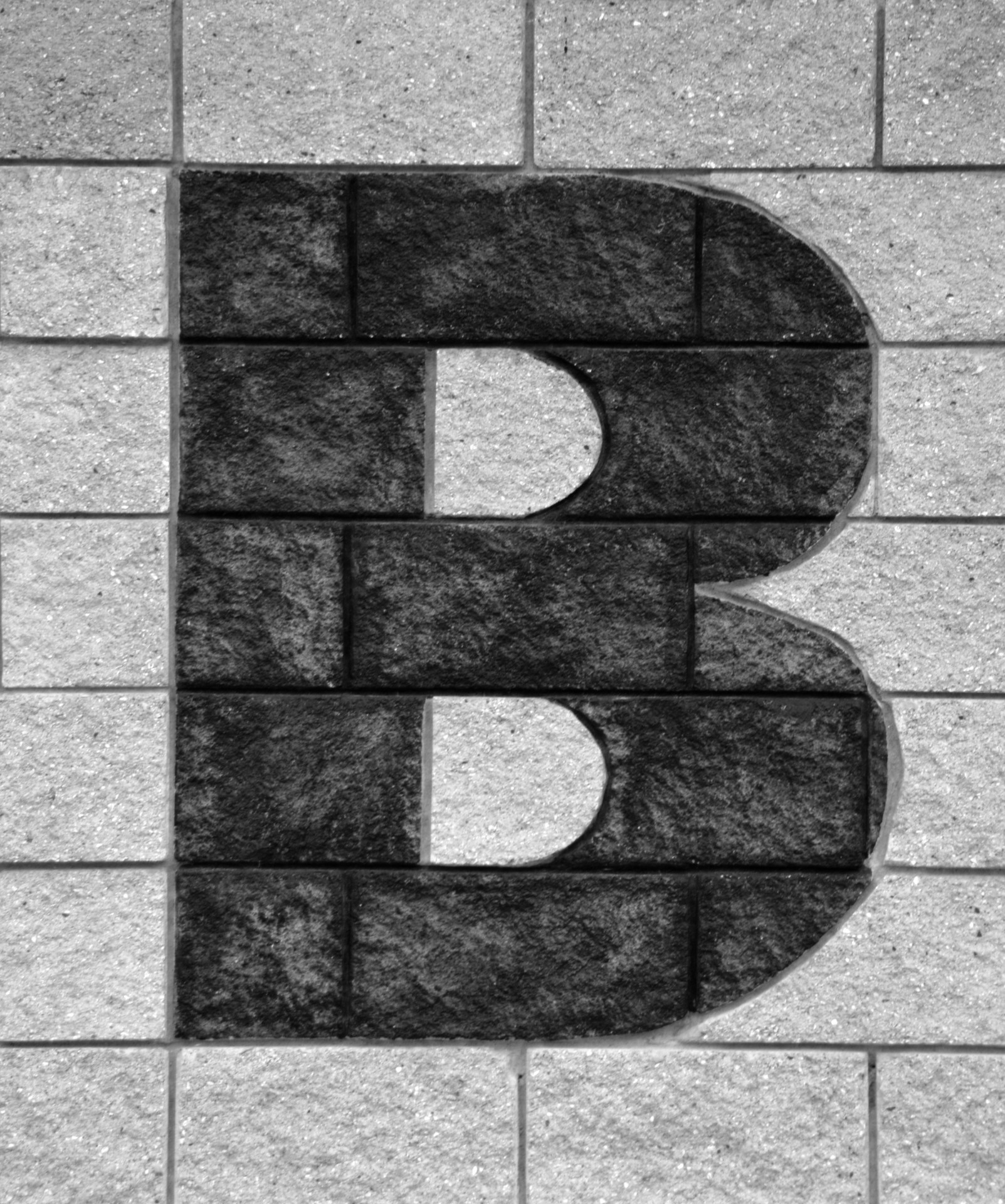 Scrisoare B pe Brick Wall