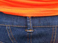 Blue jean with orange stitching