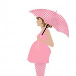 Femme enceinte avec le parapluie