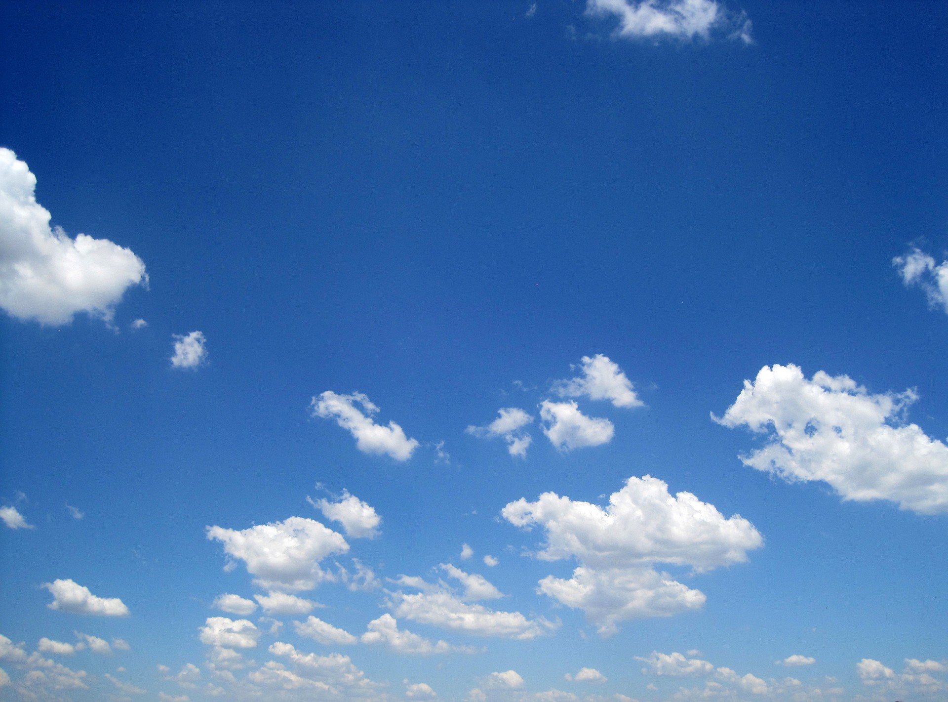 Blue Sky With Drifting Clouds Free Stock Photo - Public Domain Pictures