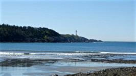 Beach och Lighthouse