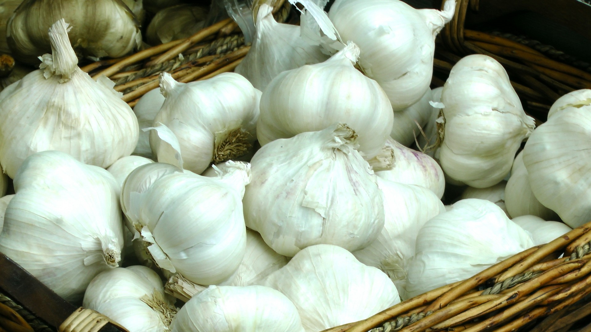 Cloves Of Garlic In A Basket