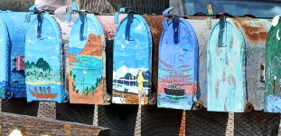 Row of Colorful Mailboxes