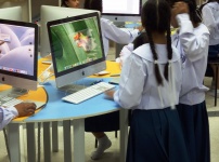 School students using Apple Mac
