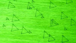 Triangles On Green Background