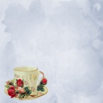 Taza de té de la vendimia con las rosas