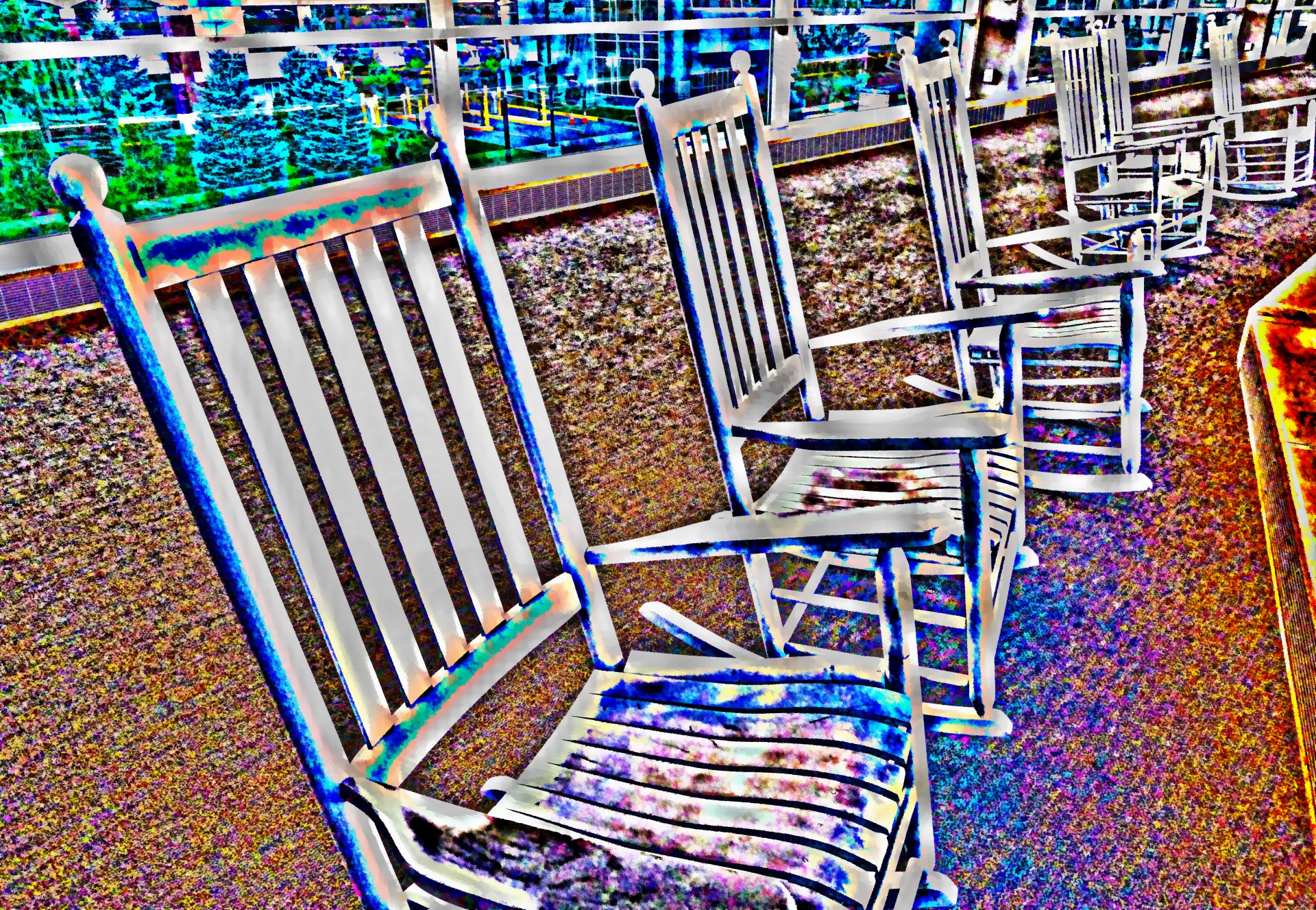 Cadeiras de balanço pintadas