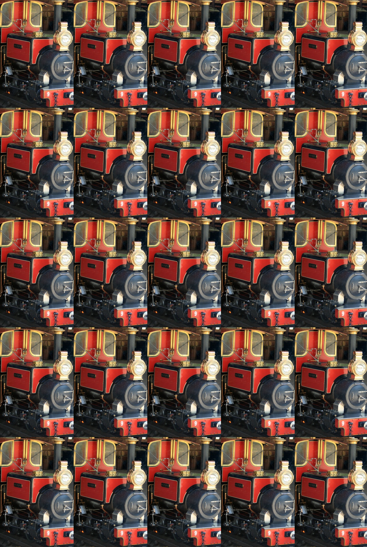 赤のモデル列車のエンジンの壁紙