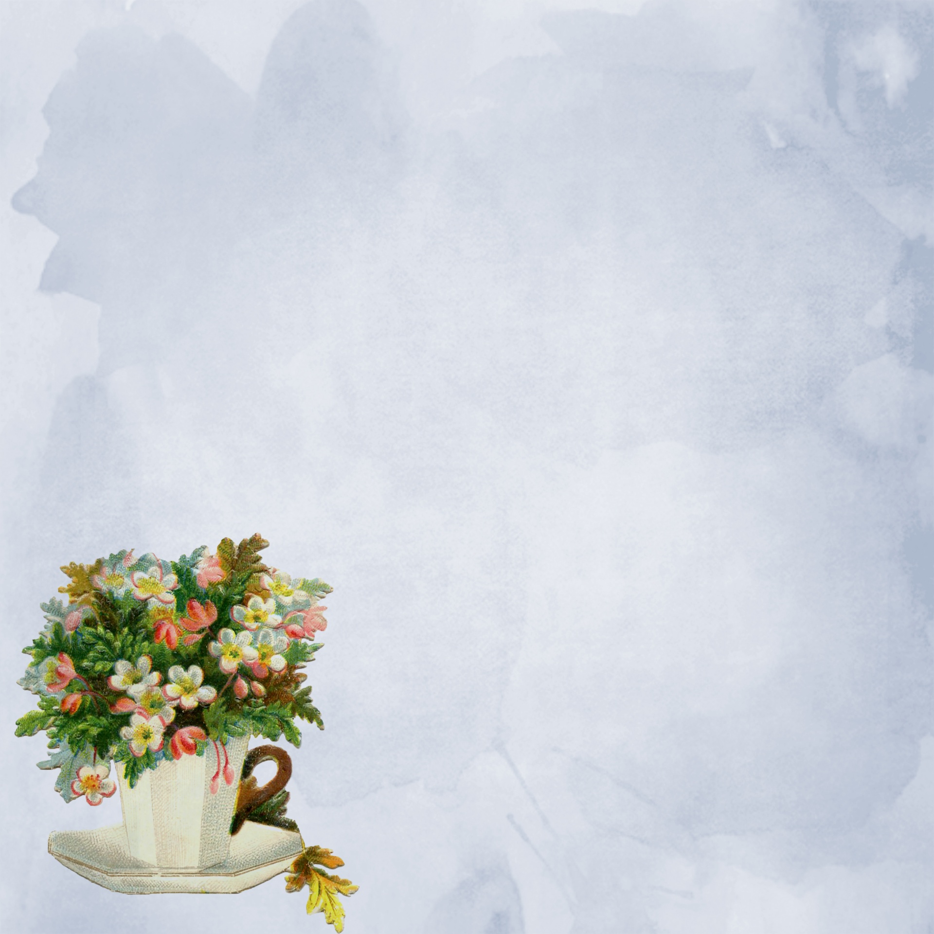 Taza de té de la vendimia con las flores