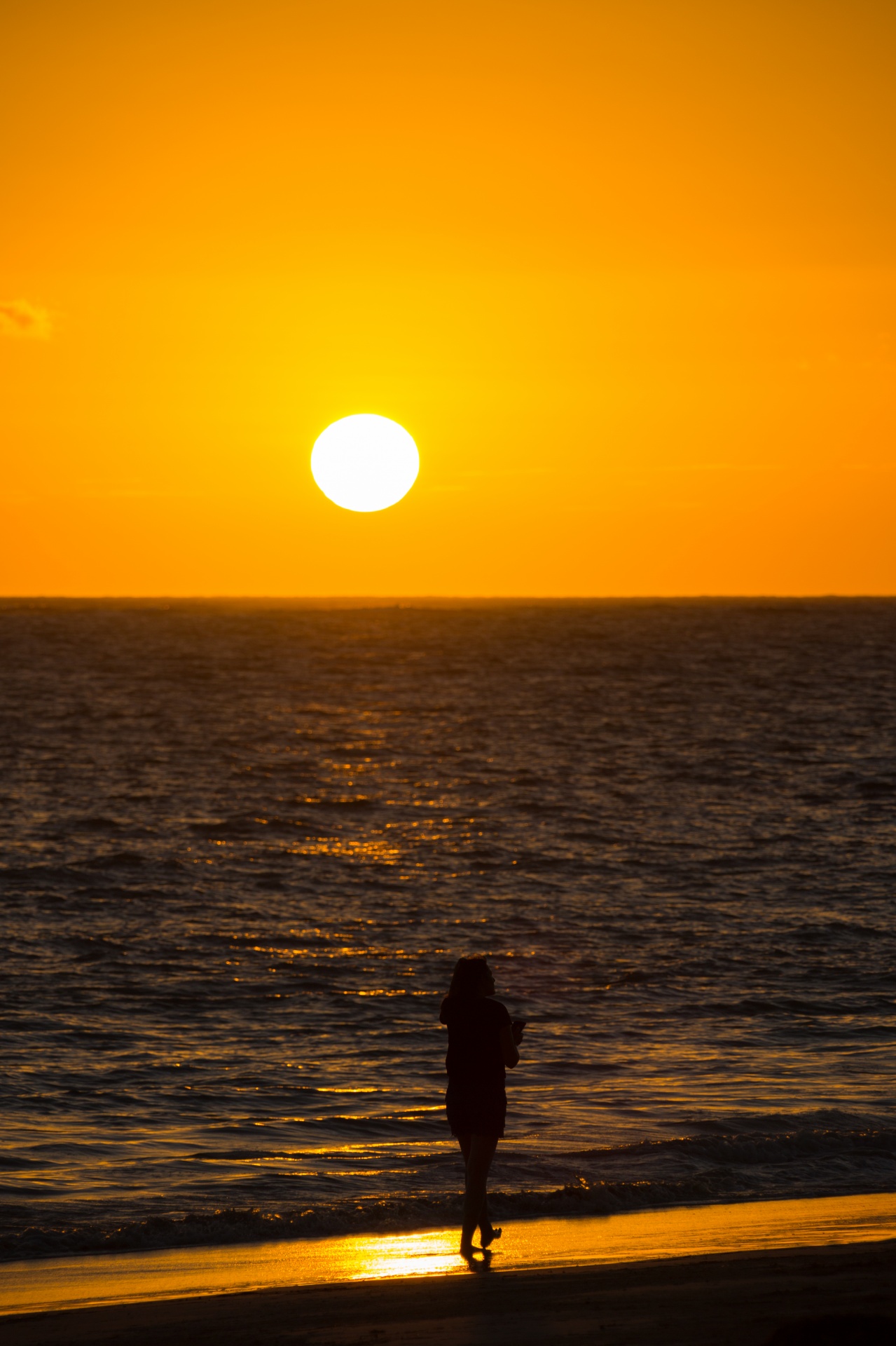 Woman Silhouette At Sea Sunrise