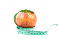 Яблоко с измерительная лента