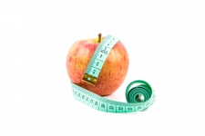 Яблоко с измерительная лента