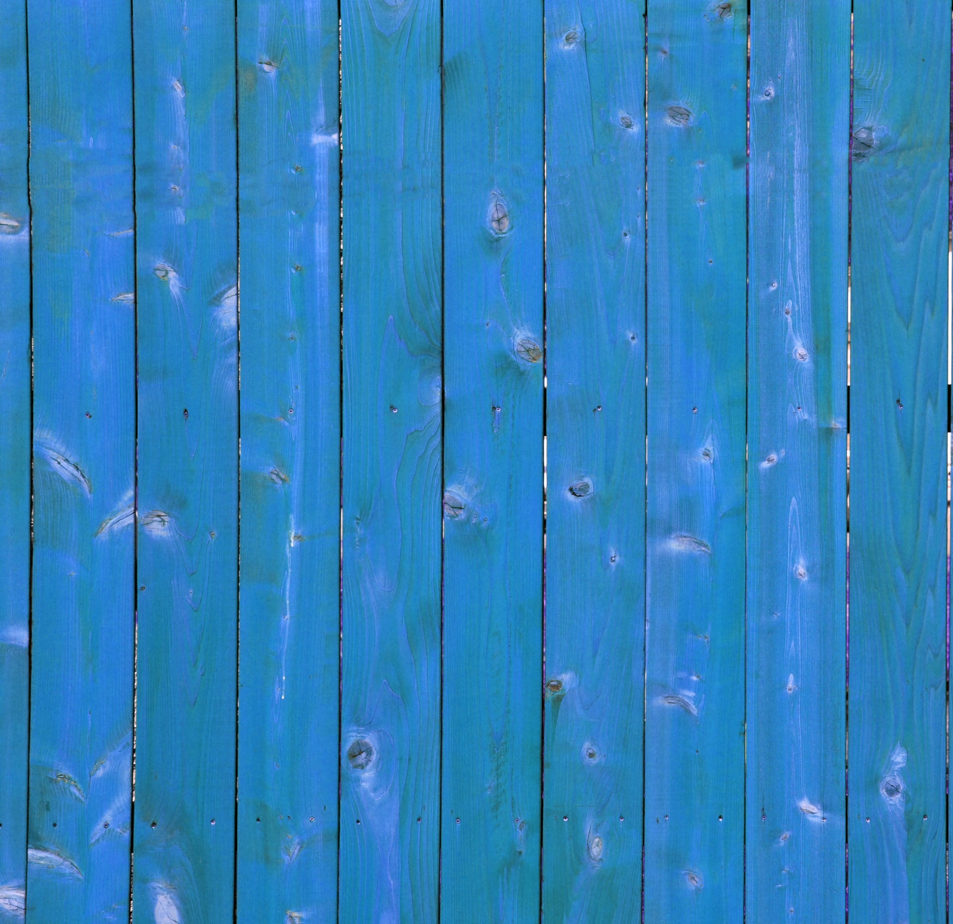 青い木製のフェンスの背景