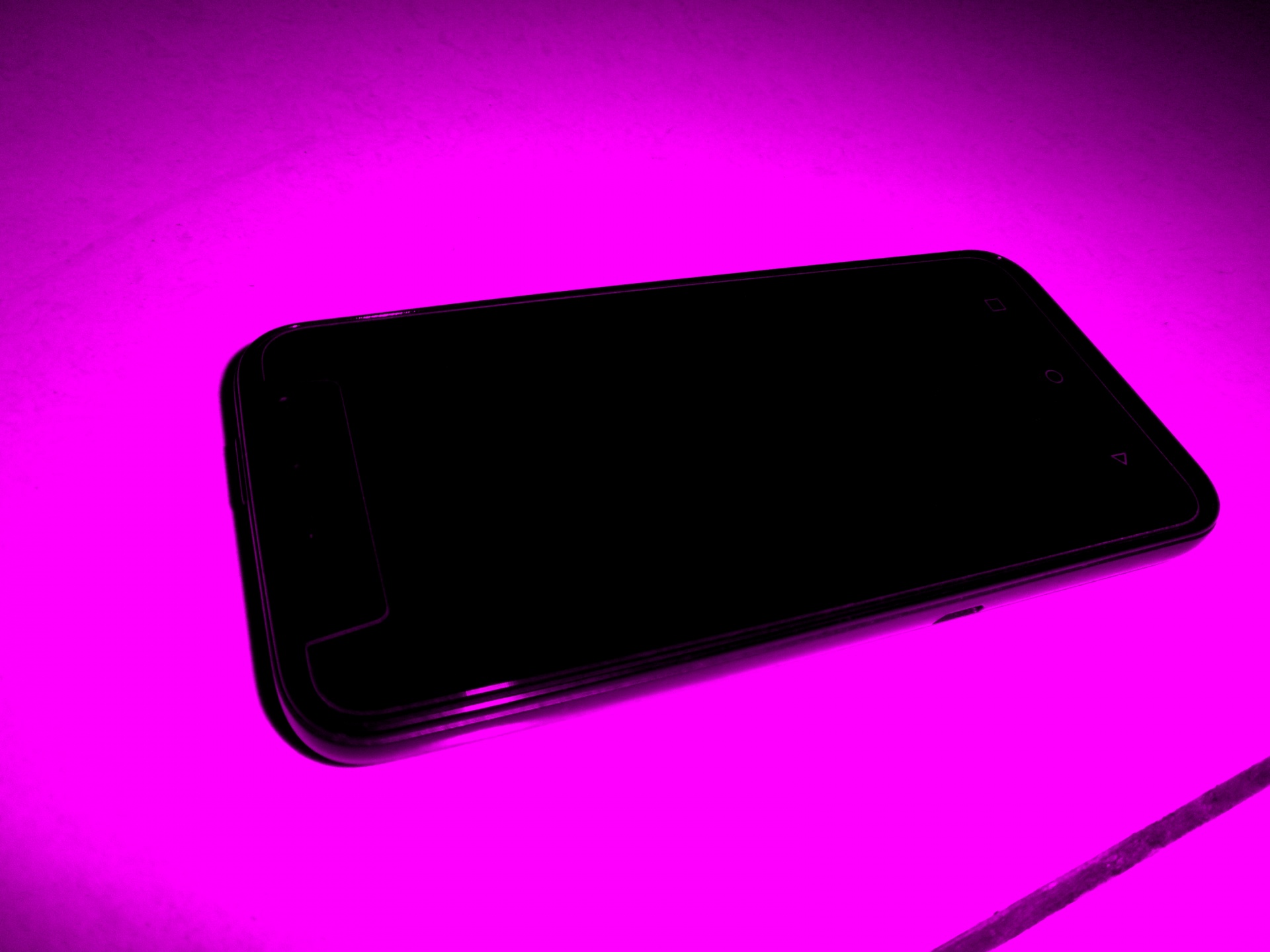 携帯電話 - ピンクの背景