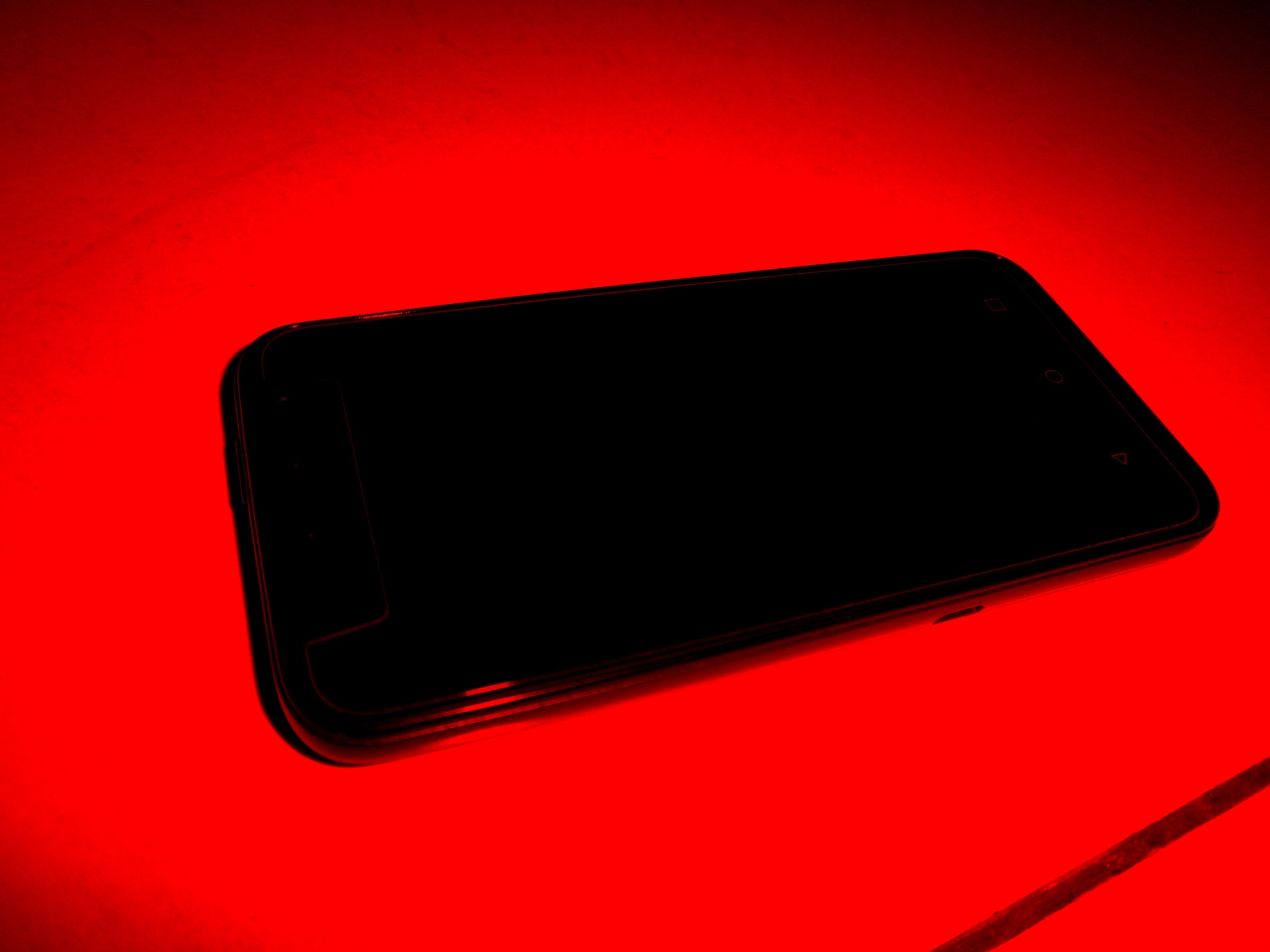 携帯電話 - 赤の背景