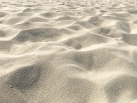 Plážový písek na pozadí