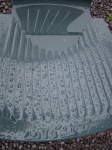 Cadeira de jardim na chuva