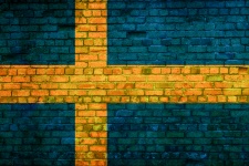 Švédsko vlajka namaloval na cihlové zdi