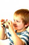 Copilului şi aparatul foto