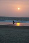 Girl walking at Sunset