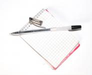 Cuaderno con bolígrafo