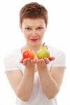 Kvinna med äpple och päron