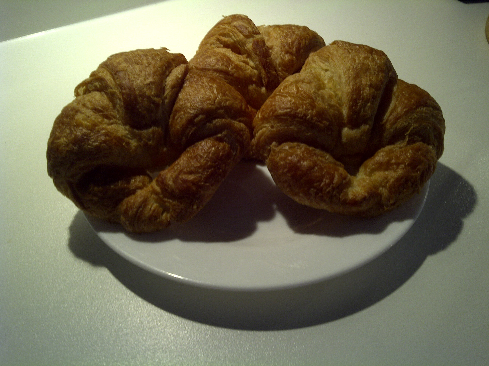 Three Croissants On A White Plate Free Stock Photo - Public Domain Pictures