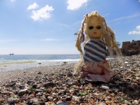 Boneca na praia