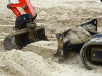 Excavator Digging Sand
